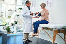 GettyImages-1131359216-doctor-blood-pressure-exam