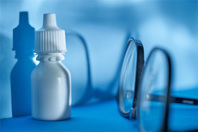 Eyedrops And Eyeglasses GettyImages-1385636011