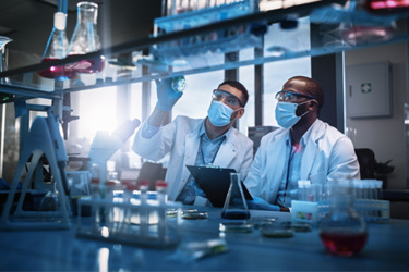 Scientists In Lab GettyImages-1354171846