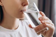 GettyImages-1440717302 drinking glass of water