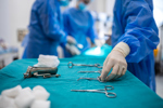 GettyImages-2282710508-doctor-operation-operating- gloves