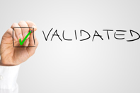 hand-putting-check-inside-box-for-validated-option-iStock-536686995