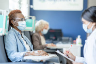 Solving The Silent Dropout Problem In Specialty Disease Trials GettyImages-1348321050-trial-patients-bloodwork