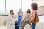 doctor with adult female patient-GettyImages-1661446453