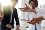 Oncology PI Shares Lessons Learned And Successes Working With Basic Scientists Doctor with hospital management-GettyImages-1130406795