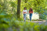 Hispanic-mother-and-daughter-walking-a-park-(high-res)jpg-(1)