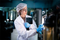 GettyImages-1756895645-quality-inspecting-system-gloves-clipboard