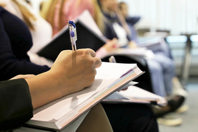 Lecture, business meeting, staff training-GettyImages-1166624555