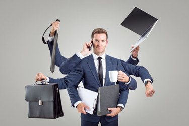 Businessman many arms-GettyImages-1272401394