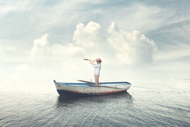 Guy On Boat In Water Looking Guy On Boat In Water Looking
