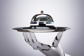 Robot holding service bell-GettyImages-949212002