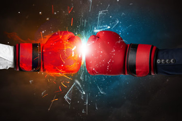 Fighting hands breaking glass-iStock-1158205918