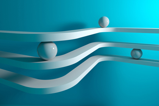 White spheres on curved lanes over blue wall-GettyImages-1390877978