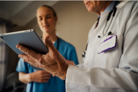 TrialKit For Patient Registry Studies GettyImages-1271888354 doctor nurse tablet