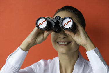 Businesswoman with binoculars-GettyImages-1369803539 Businesswoman with binoculars-GettyImages-1369803539