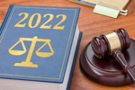 Law book with a gavel - 2022 GettyImages-1355117041