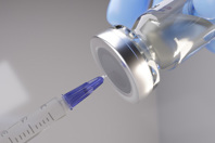 Syringe and vaccine vial-GettyImages-1855924776