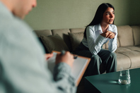 therapist-with-girl-GettyImages-2259778873