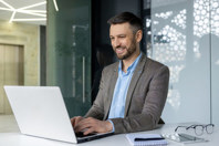 Pioneering Cancer Research Meets Unparalleled Veeva Vault Integration GettyImages-2105627268-business-man-laptop-pen-and-paper