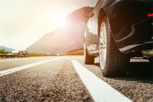 Greenphire Travel GettyImages-1319939893-car-travel-road