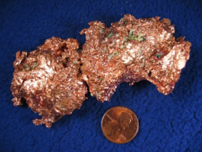 This image shows copper in ore. The penny was once composed mainly of copper, but since 1982 the United States Mint has made pennies from copper-plated zinc.

Credit: USGS