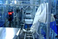GettyImages-499481438-sterile-glove-isolator-in-lab