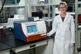 Scientist standing with SpectraMax iD5e mutlt-mode microplate reader gas mixer included Scientist standing with SpectraMax iD5e mutlt-mode microplate reader gas mixer included
