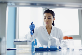 Utilizing An Integrated Cell Line Development Approach With High Producing Stable Pools Scientist research laboratory pipette GettyImages-487041629