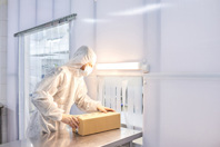Worker Packing Medicinal Products-GettyImages-1221368752