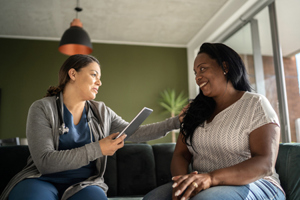 Doctor talking to patient-GettyImages-1330555438