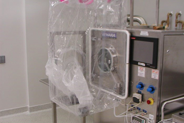 Containment System For Tablet Coating Systems 