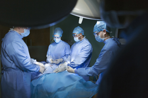 Surgeons performing surgery-GettyImages-1147637151