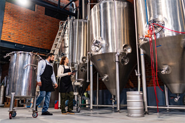 GettyImages-2234690894-brewery-people-walking