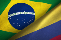 Columbia and brazil flags together-GettyImages-1089427714