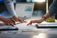 Increasing Drug Manufacturing Efficiency With Intelligent Master Batch Record Design GettyImages-1751848523-meeting-evaluation-charts-table