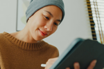 Bring Your Own Device (BYOD) Clinical Trials GettyImages-2156796837 cancer patient tablet