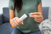 Women using auto-injector syringe-GettyImages-1184225794
