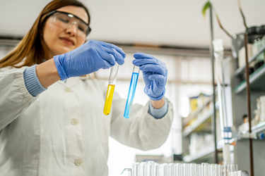 scientist comparing test tube samples-GettyImages-2194258302 scientist comparing test tube samples-GettyImages-2194258302