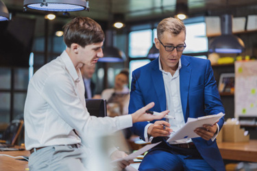 finacial staff meeting-GettyImages-1412797969