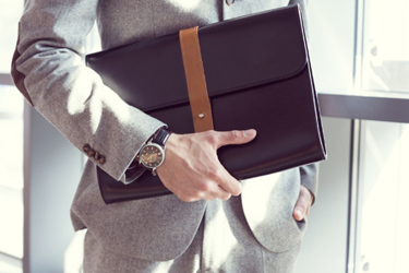 businessman-holding-briefcase-GettyImages-468102762