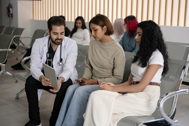 Specialist doctor with patients-GettyImages-2256509672 Specialist doctor with patients-GettyImages-2256509672
