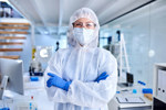 GettyImages-1297378718-contamination-gloves-suit-scientist-laboratory
