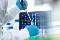 GettyImages-1334095553-vial-computer-data-pipette-scientist-lab