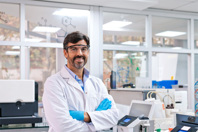 Enabling Advanced Bioprocessing: Solutions That Challenge The Status Quo GettyImages-1635843645-scientist-smiling-laboratory-equipment