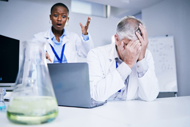 scientists anxiety in lab-GettyImages-1605434677