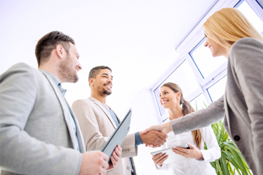 iStock-515445694-executives-meeting-team-group-agreement