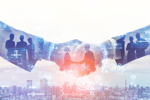 Suvoda And Greenphire Announce Completion of Merger GettyImages-1209662260 shaking hands