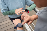 RFK Jr. Wants Every American Wearing A Wearable. How Can Pharma Build A Business Around It? checking pulse after training-GettyImages-1405814556