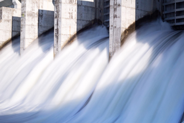 Water-rushing-out-of-hydro-dam-GettyImages-507277772