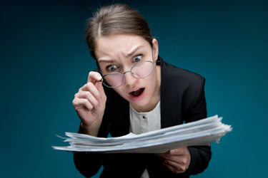 teacher dissatisfied with paperwork errors-GettyImages-1224480479 teacher dissatisfied with paperwork errors-GettyImages-1224480479